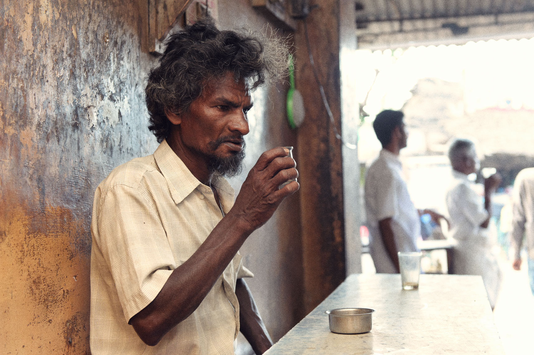Lunch break at the tea shop, India.